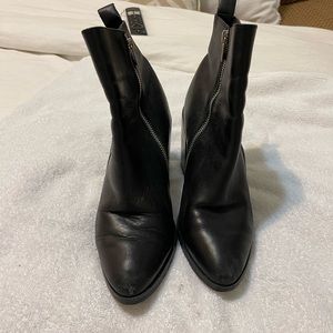 Steve Madden black leather boots with silver accent